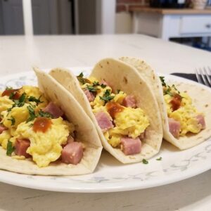 Tacos de huevo con jamon (pieza)